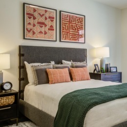 a bedroom with a large window